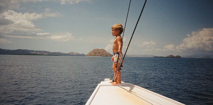 Kid on sailing boat