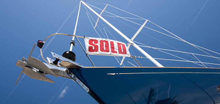 boat with sold sign
